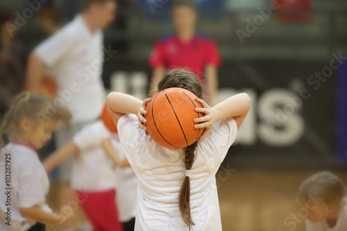 Rear view of girl with basketball ball © sociopat_empat
