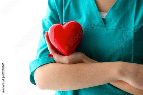 Close-up of unknown female doctor with stethoscope isolated