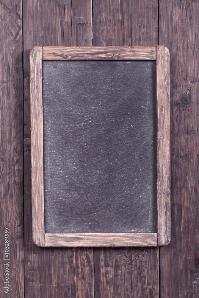 Fototapeta premium Rustic menu blackboard on wooden wall