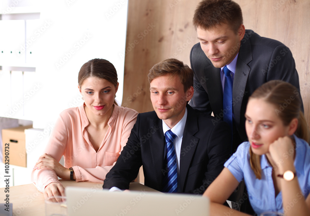 Business meeting - manager discussing work with his colleagues Business meeting - manager discussing work with his colleagues