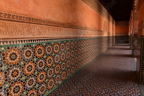 Medersa Ben Youssef, Marrakech, Morocco, Africa. The courtyard ornately tiled mosaic walls and floors of an Islamic school now open to the public. photo