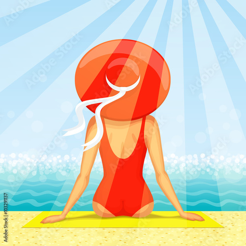 Woman sitting at the beach