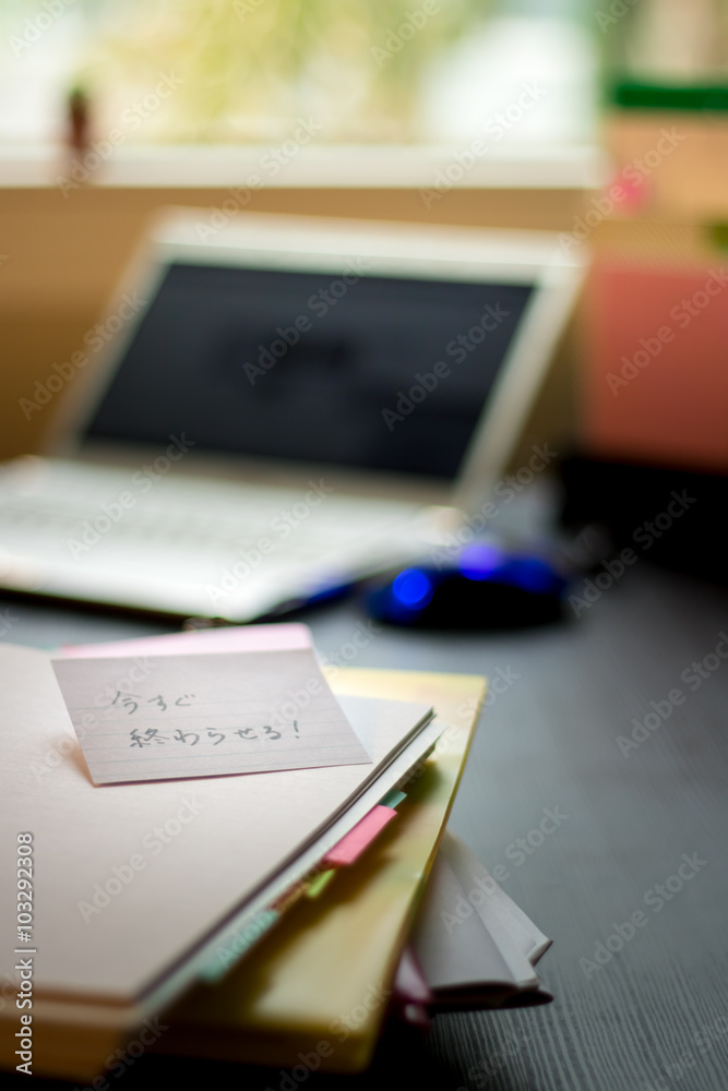 Finish ASAP; Stack of Documents and Laptop at working Desk. Finish ASAP; Stack of Documents and Laptop at working Desk.