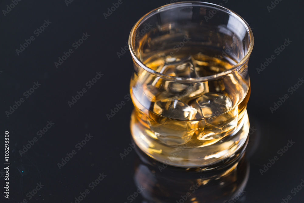 whiskey on the rocks on glass table whiskey on the rocks on glass table
