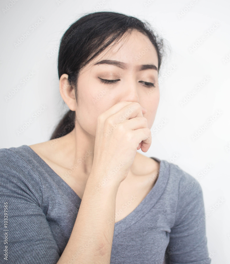 The girl felt ill with coughing and sneezing all the time on a w The girl felt ill with coughing and sneezing all the time on a w