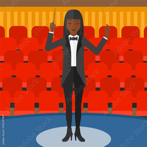 Conductor directing with baton.