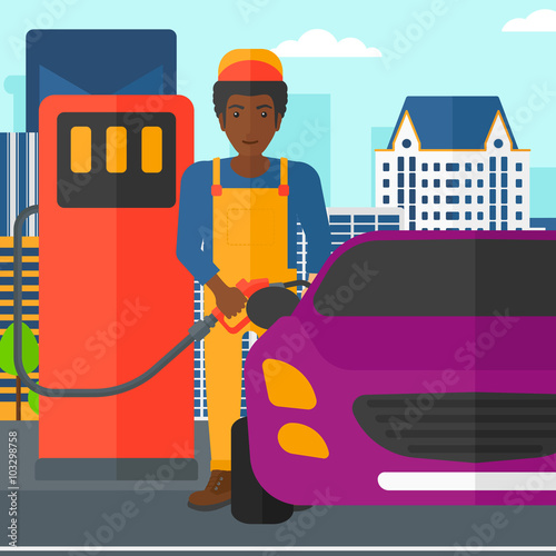 Man filling up fuel into car.