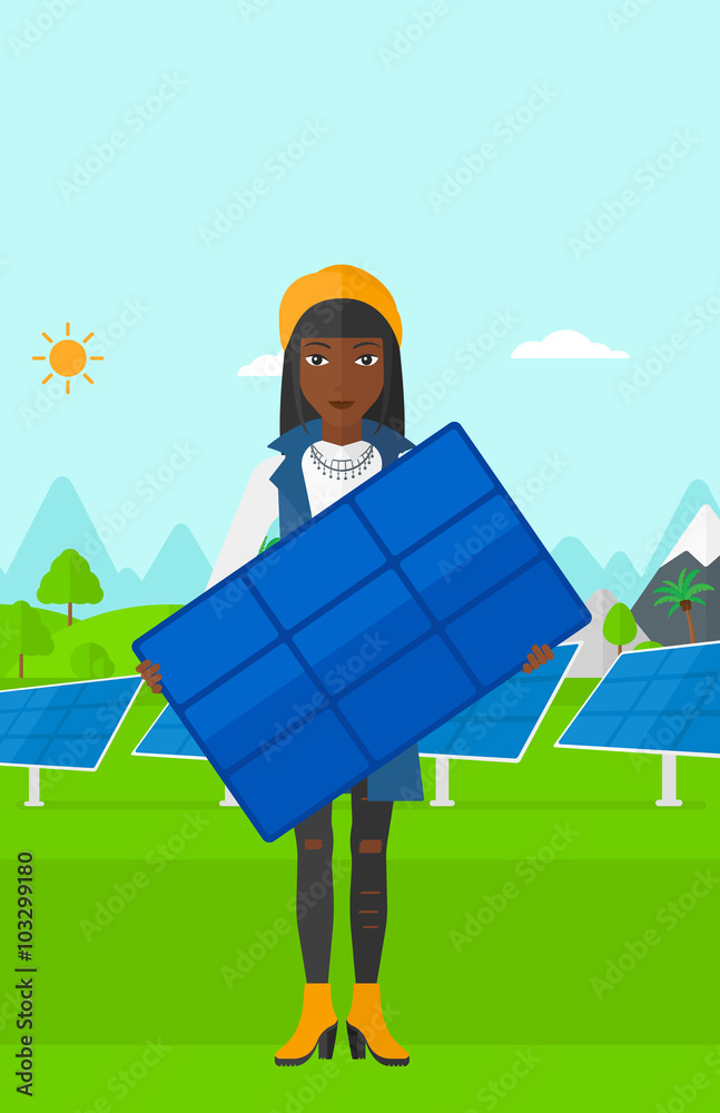 Woman holding solar panel.