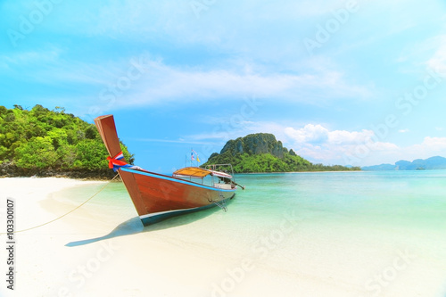 Longtail boat at famous sunny Long Beach, Krabi Thailand, Andama