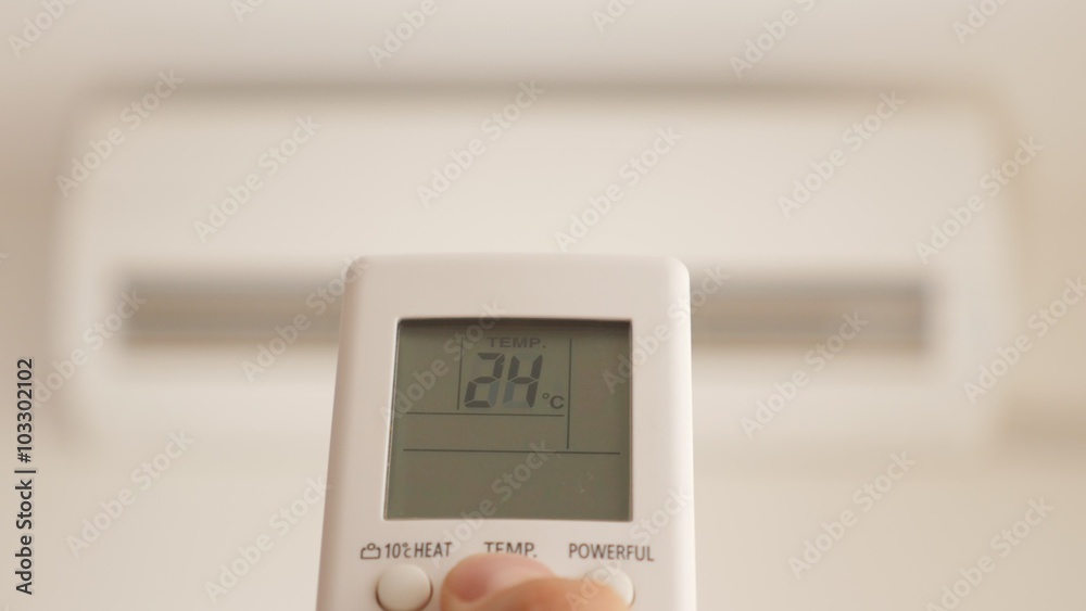 Heating up room by changing temperature on air conditioner remote control 4K 2160p UltraHD footage - Air condition wireless remote control in hands for room temperature adjust 4K 3840X2160 UHD video Heating up room by changing temperature on air conditioner remote control 4K 2160p UltraHD footage - Air condition wireless remote control in hands for room temperature adjust 4K 3840X2160 UHD video