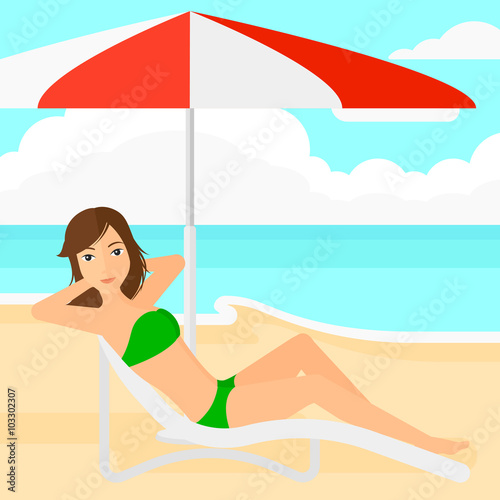 Woman sitting in chaise longue.