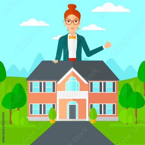 Real estate agent showing thumb up.