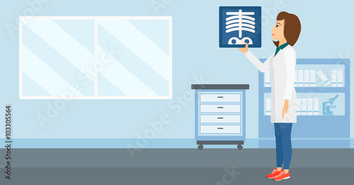 Doctor examining radiograph.