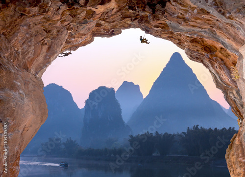 Photography Deep high Cave extreme Climbers on Sunrise in China Mountains