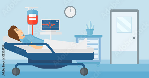 Patient lying in hospital bed.