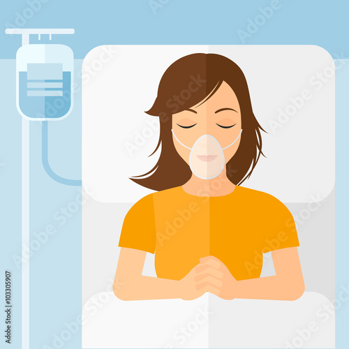Patient lying in hospital bed.