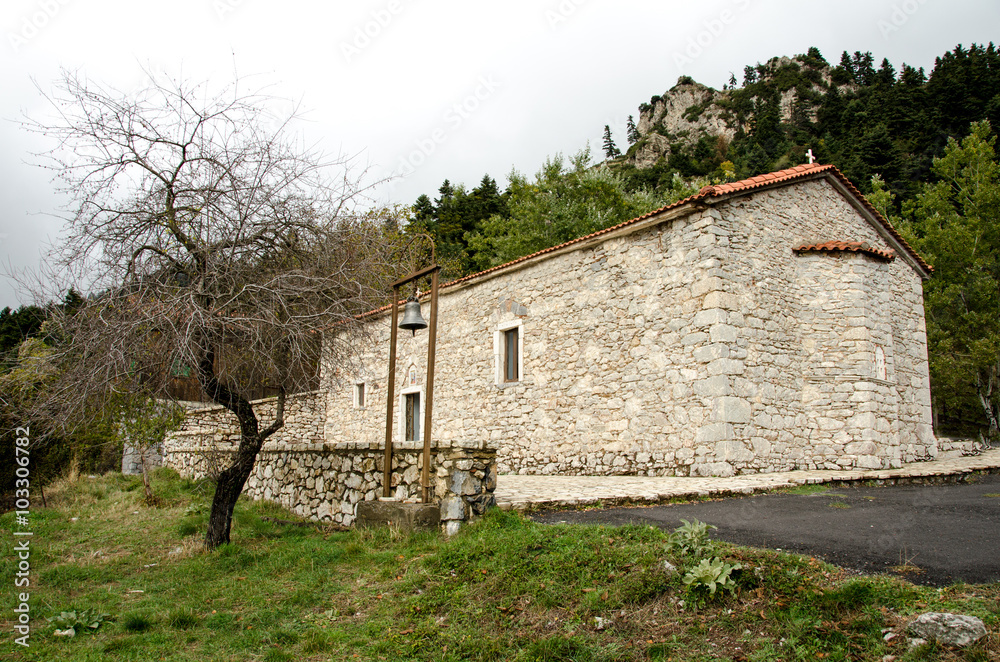 small traditional stone church in the mountains of Mainalo,Arcadia,Greece small traditional stone church in the mountains of Mainalo,Arcadia,Greece