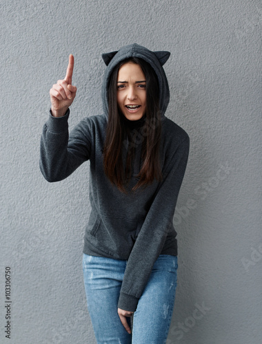 Close-up of girl pointing index finger