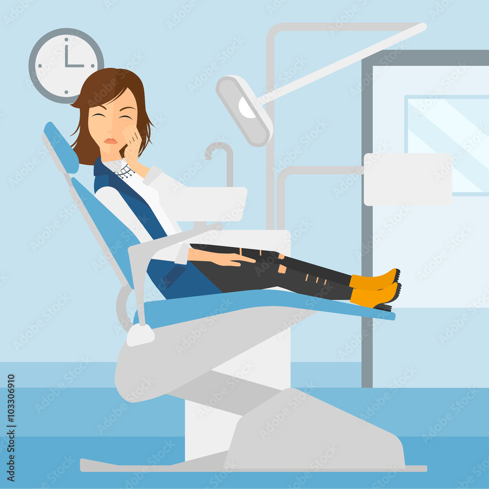 Fototapeta premium Woman suffering in dental chair.