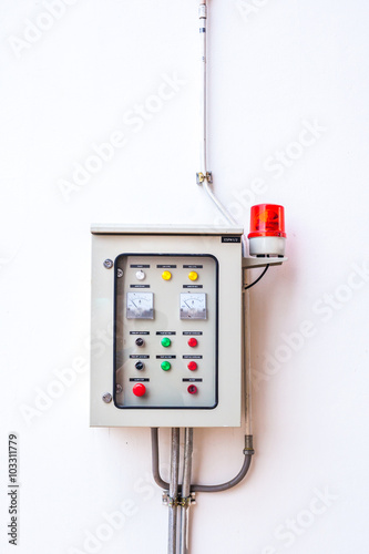 Controller Electric distribution box on brick wall