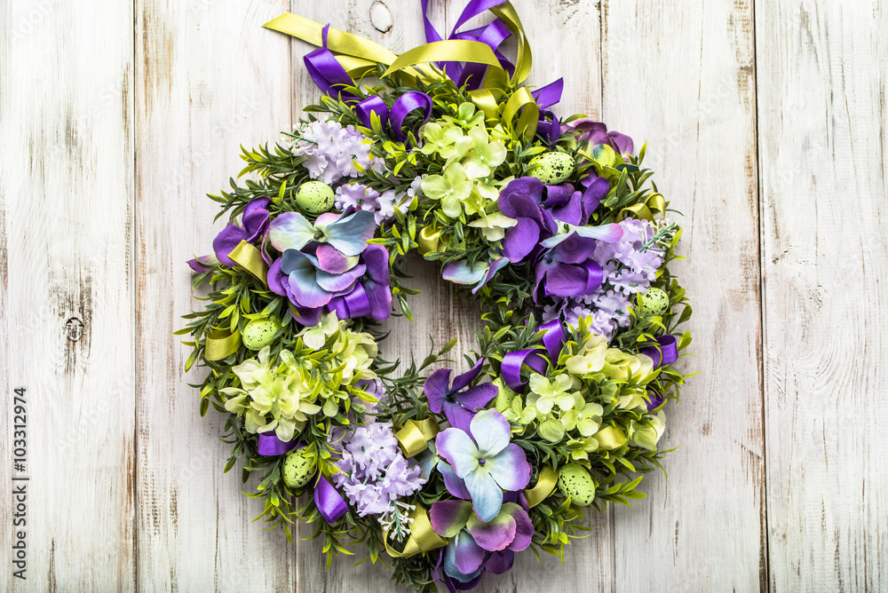 Fototapeta premium Easter decoration from easter eggs, easter boxwood and flowers.