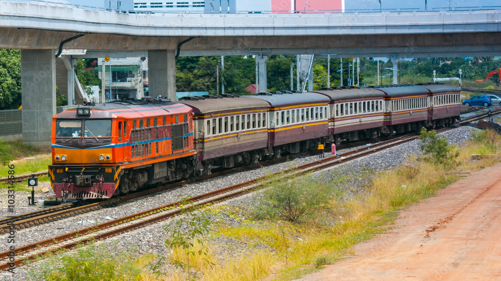 Obraz premium Passenger train at urban area, 2013.