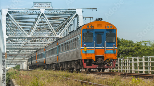 Passenger train  was passing through steel bridge, 2013.
