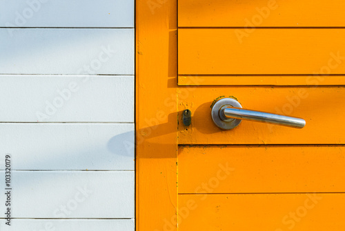 particolare di una porta di legno colorata photo