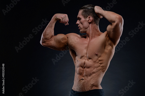 Handsome power athletic young man with great physique.