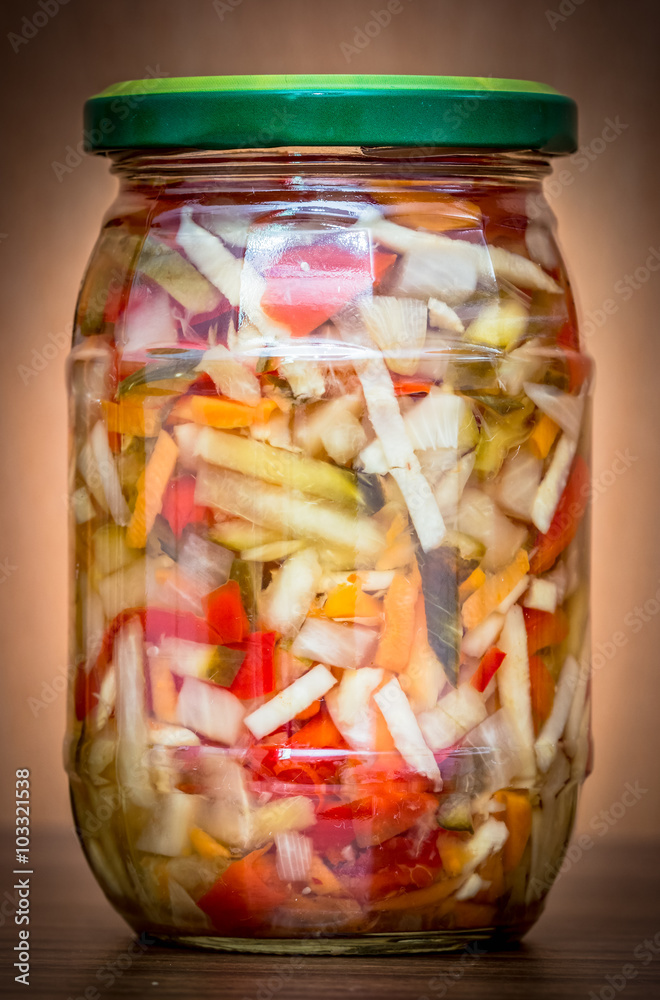 Jar of slices of pickled vegetables Jar of slices of pickled vegetables