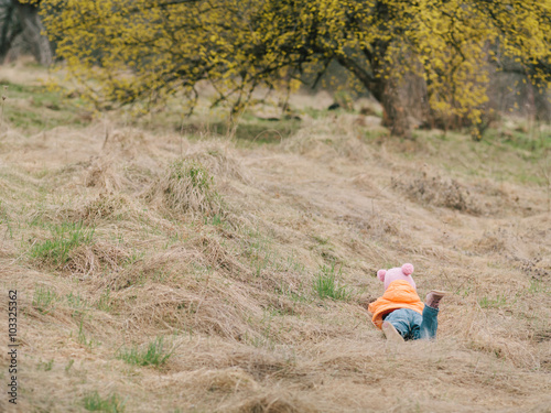 girl playing in the garden