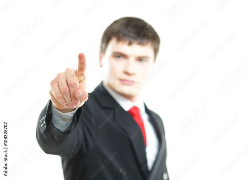 Young successful business man pressing imaginary button isolated on white Young successful business man pressing imaginary button isolated on white