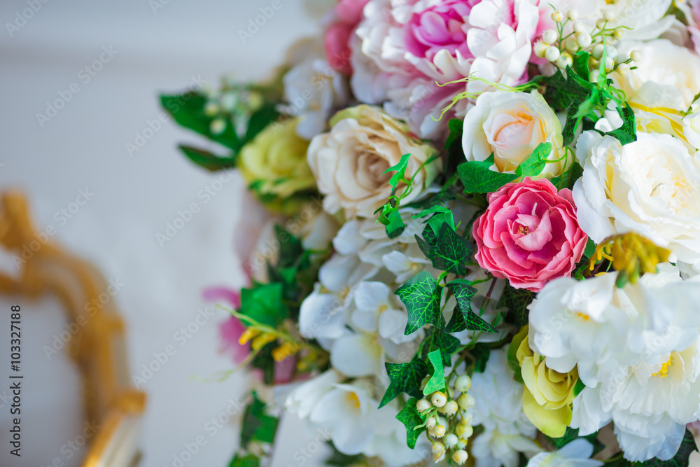 Beautiful flowers in classic white interior Beautiful flowers in classic white interior