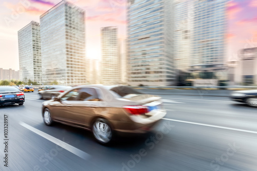 Car driving on road, motion blur © 06photo