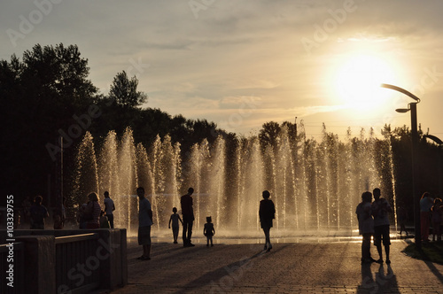 fountain spray sun evening