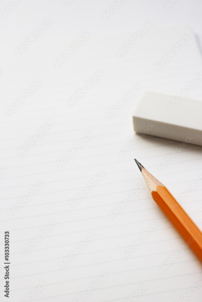 Blank notebook with pencil, and eraser on white background. Blank notebook with pencil, and eraser on white background.
