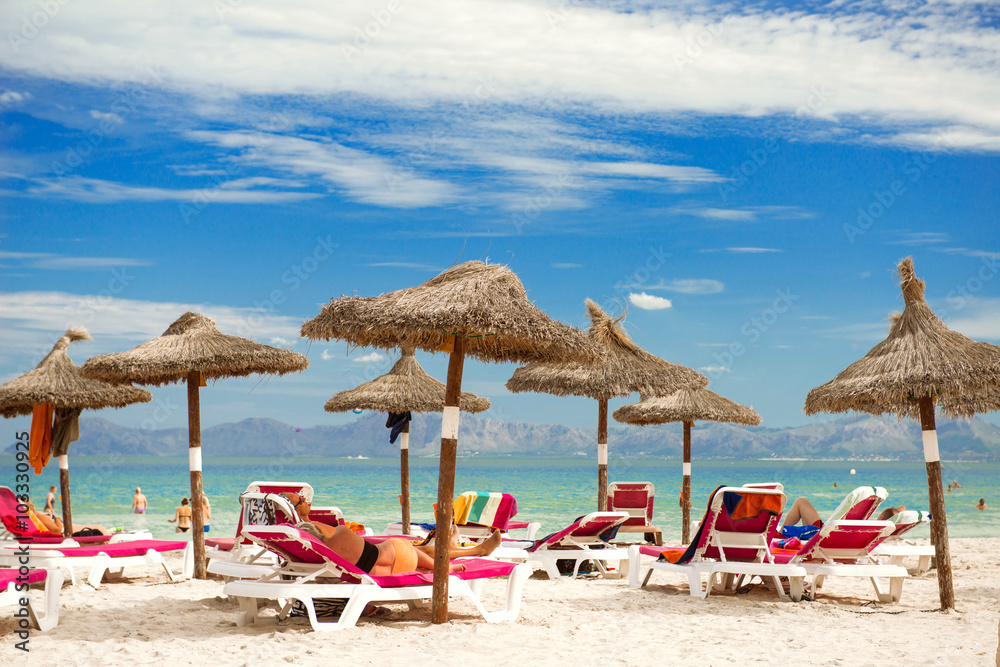 Beach chairs and parasols on the beach of Majorca - 7225