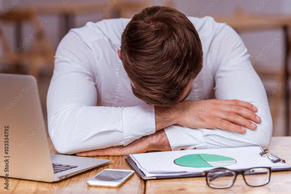 Attractive businessman working Attractive businessman working