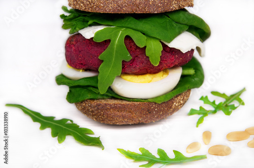gluten free vegan sandwiches with beet hummus and spinach, egg,