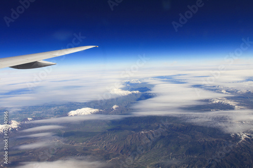 Window veiw from airplan blue sky  window seat