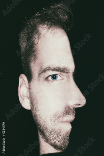 Konstfotografi man with combined view of front and side face