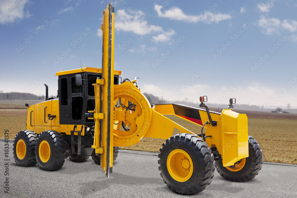 Modern road grader on the road construction Modern road grader on the road construction