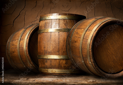 Fototapeta Wooden barrels in cellar