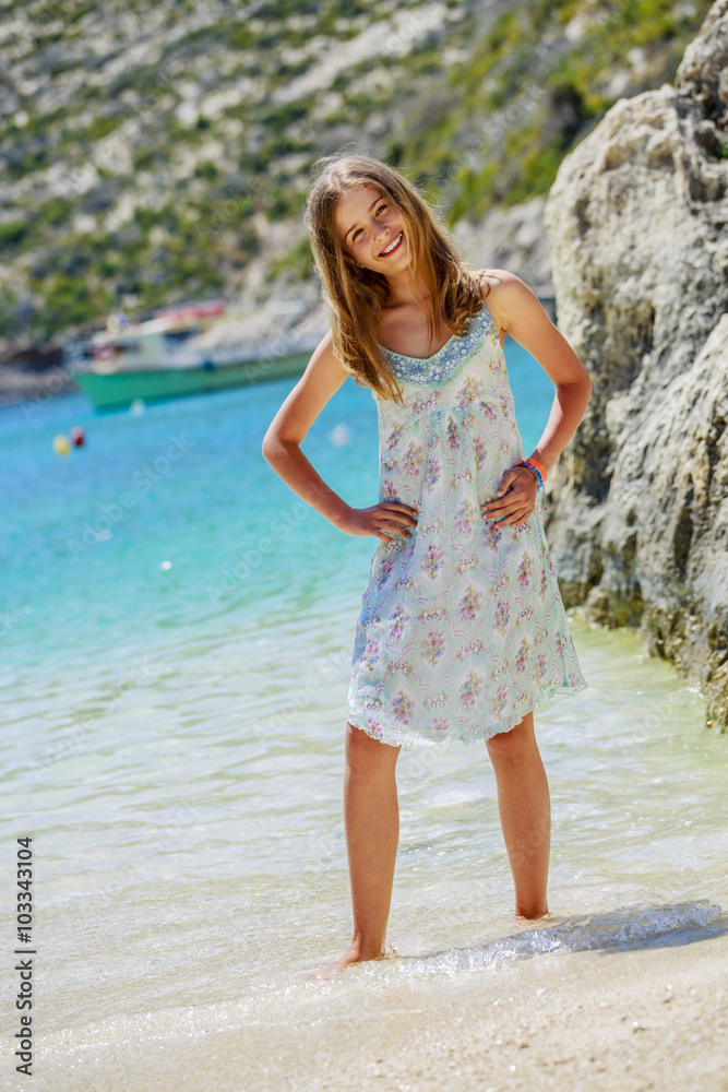 Summer vacation, portrait of lovely fashion young girl on the beach
Summer vacation, portrait of lovely fashion young girl on the beach