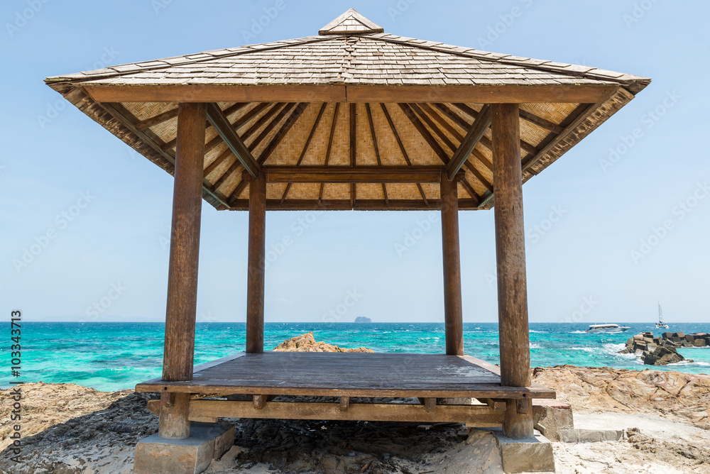 little pavilion with clear blue sea and blue sky on paradise island in Thailand little pavilion with clear blue sea and blue sky on paradise island in Thailand