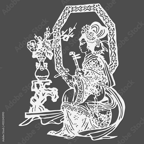 Musicienne chinoise assise devant un miroir.
