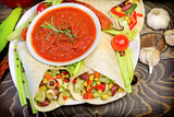 Delicious food - Mexican salad in tortilla and gazpacho sauce