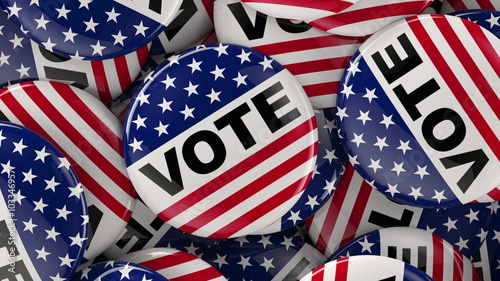 Lateral panning dolly shot of vote buttons in a box. Presidential or political election theme.