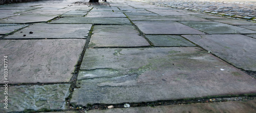 Obraz na plátně Close up of old flagstone paving blocks