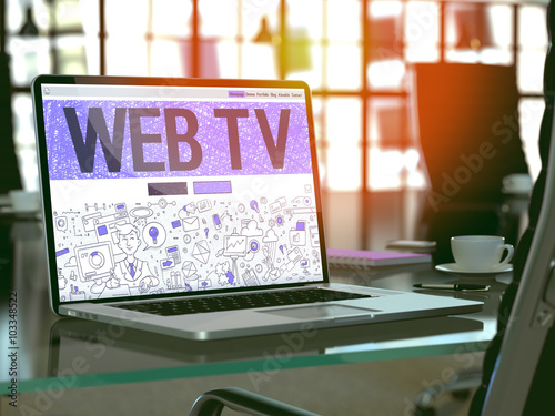 Modern Workplace with Laptop Showing Landing Page in Doodle Design Style with Text Web TV. Toned Image with Selective Focus. 3D Render.